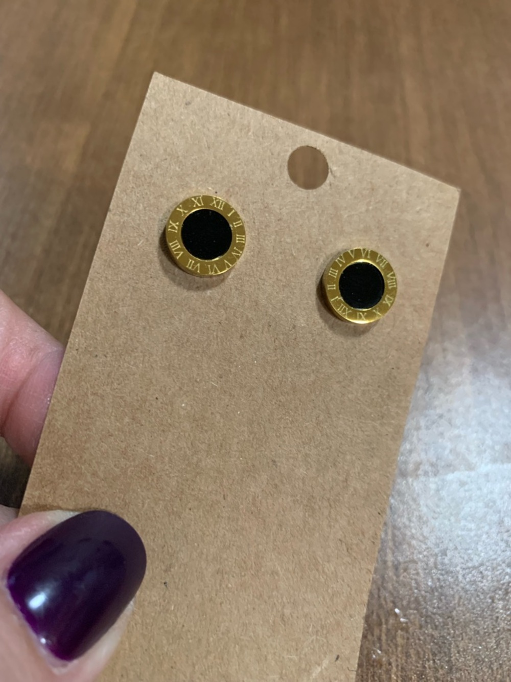 Gold-Tone Black Round Stud Earrings with Roman Numeral Detail